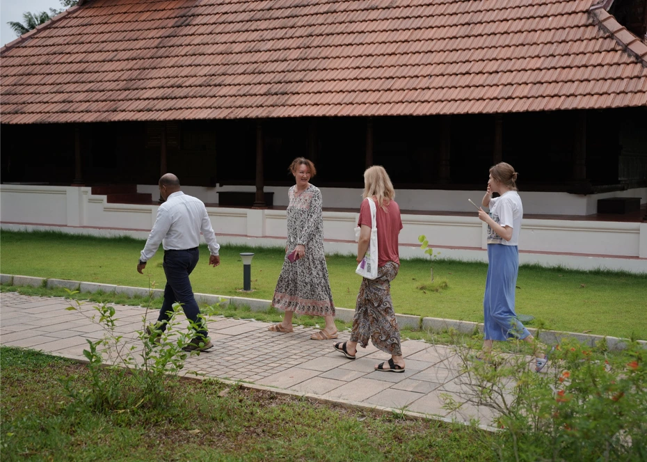 Guests walking along a path at the retreat
