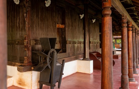 Traditional wooden massage and therapy area used for panchakarma treatment Kerala