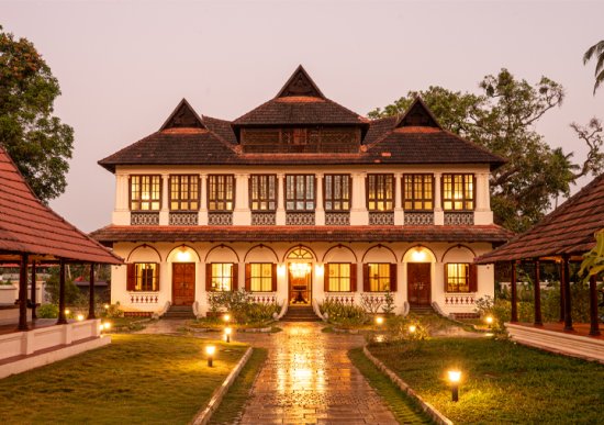 Evening view of the heritage mansion facade, a leading kerala ayurveda treatment resort in Alappuzha